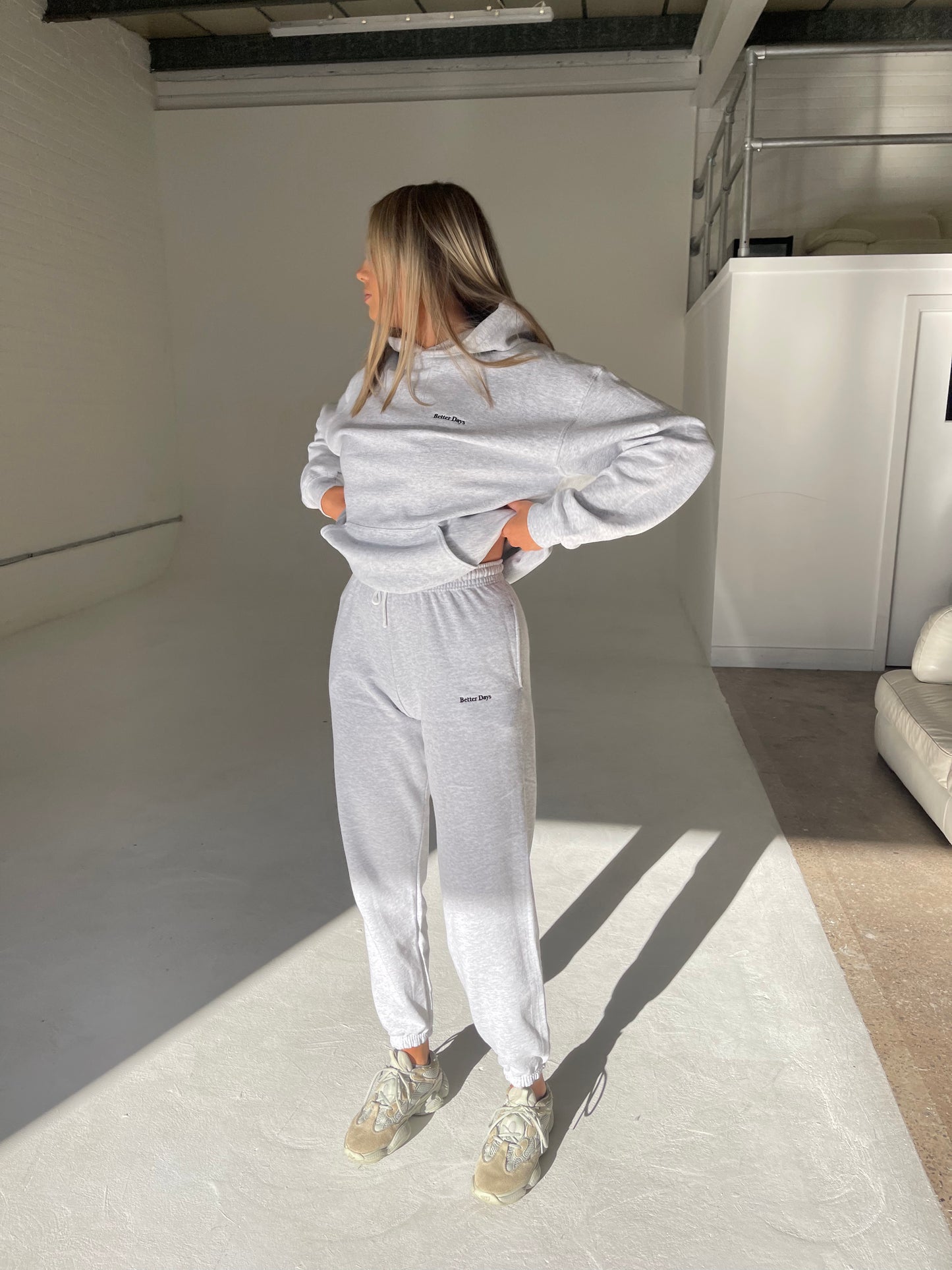 Ash grey hoodie and sweatpants set.