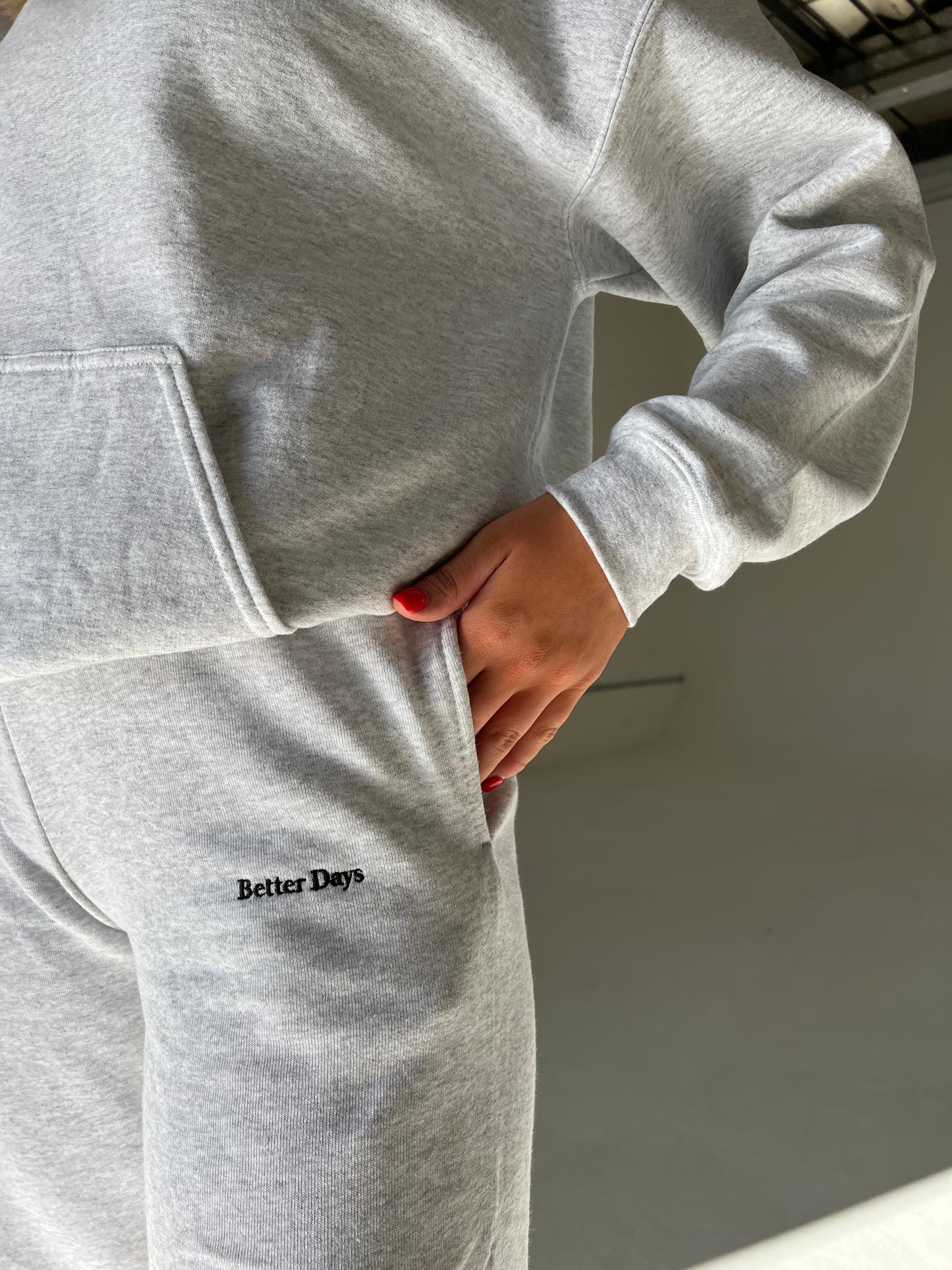 Ash grey hoodie and sweatpants set.