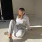 Ash grey hoodie and sweatpants set.