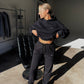 Black hoodie and sweatpants set.