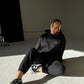 Black hoodie and sweatpants set.
