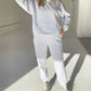 Ash grey hoodie and sweatpants set.